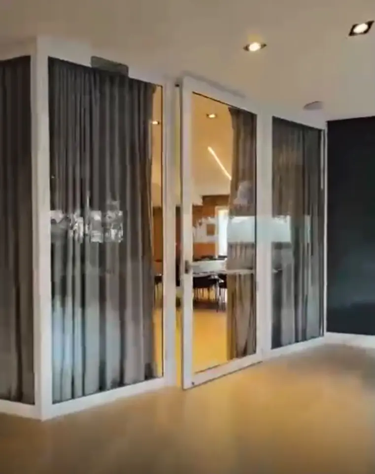 Portas de vidro para a varanda — apartamento no Edifício Vista Sul