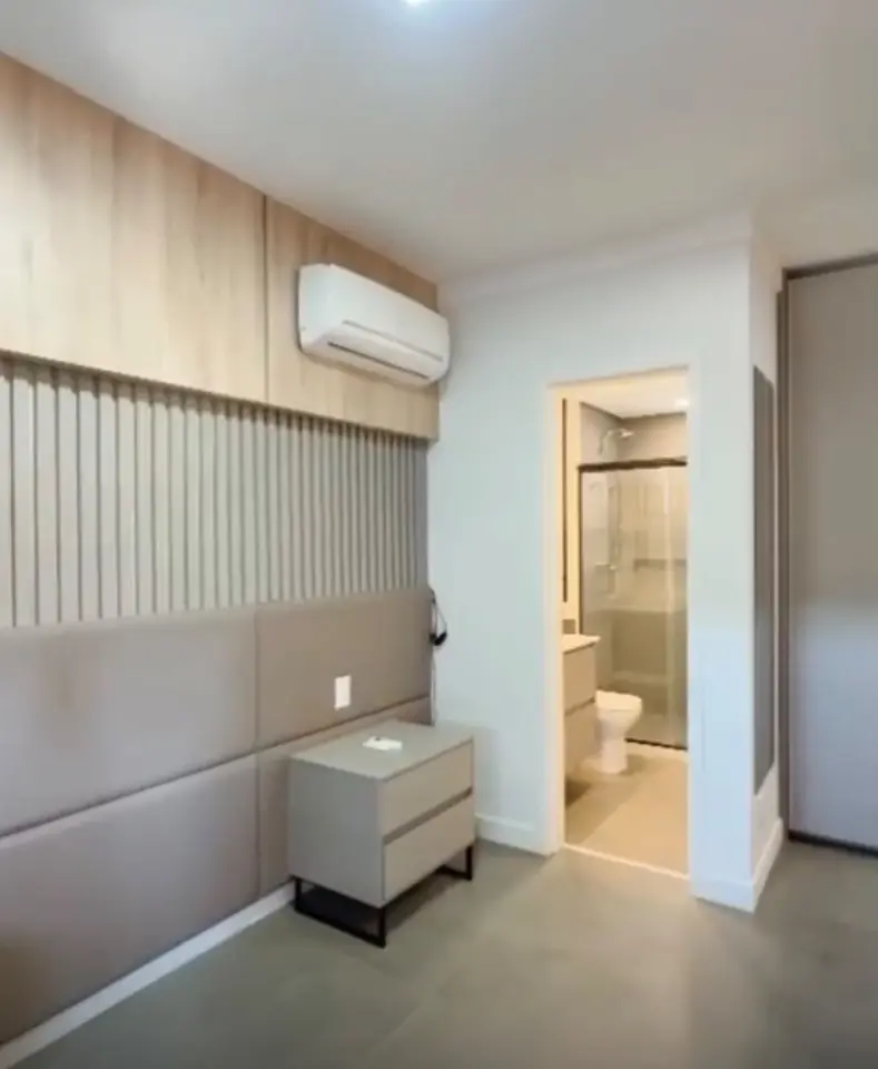 Suíte com ar-condicionado — apartamento no Edifício Vista Sul