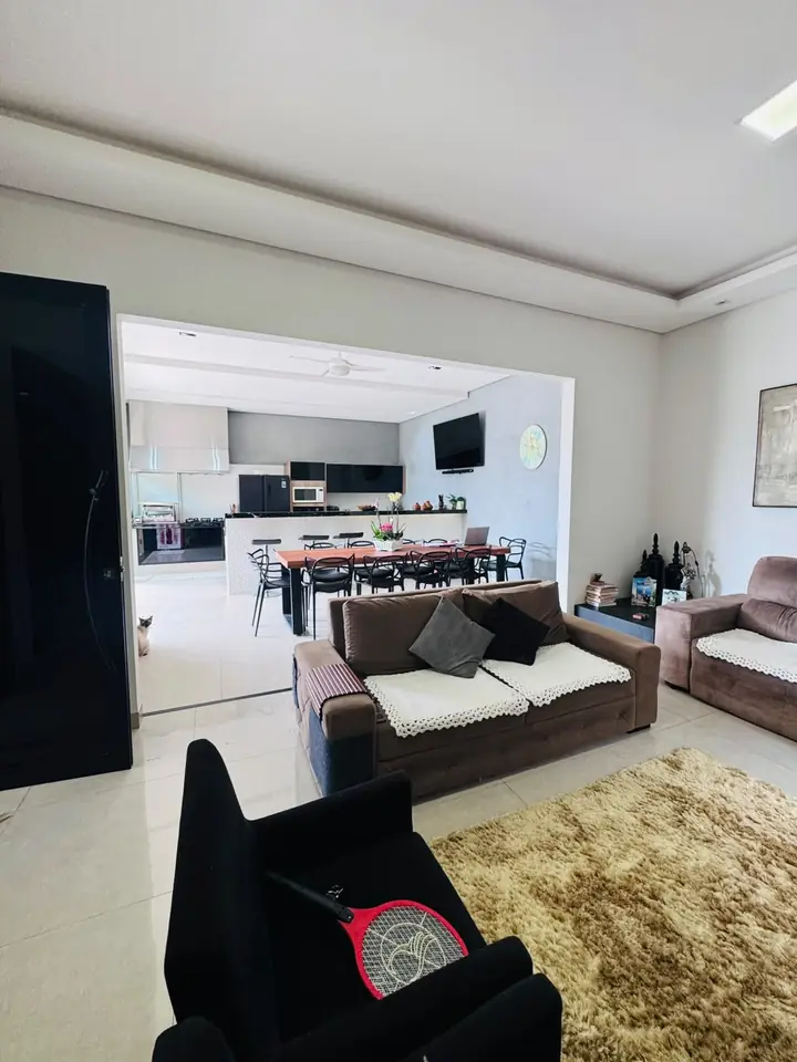 Sala de estar integrada à cozinha — casa no Jardim Cruzeiro do Sul