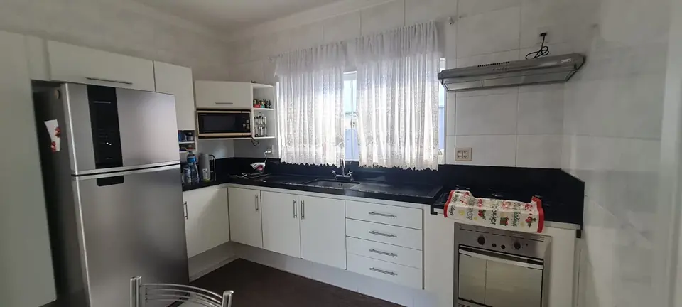 Cozinha planejada — casa no Condomínio Chácara Odete